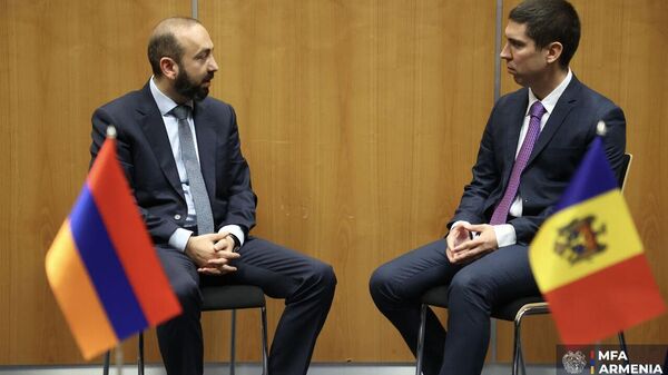 Молдова поделилась с Арменией опытом проведения выборов, включая борьбу с гибридными угрозами и дезинформацией - Sputnik Молдова