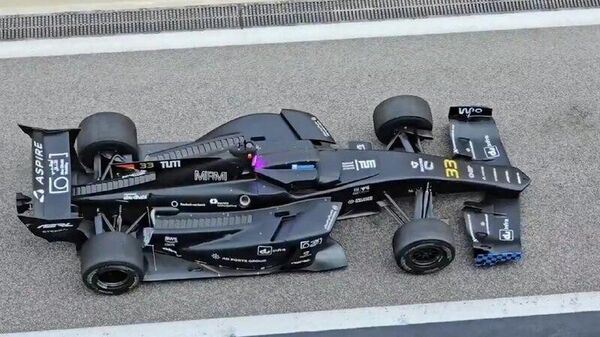 Российский пилот Формулы-1 Даниил Квят проиграл беспилотному болиду в гонке ИИ против человека, которая прошла в Абу-Даби - Sputnik Молдова