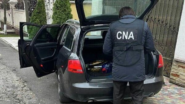 НАЦ проводит более 30 обысков в Молдове по делу о коррупции при выдаче водительских прав в районе Калараш - Sputnik Молдова