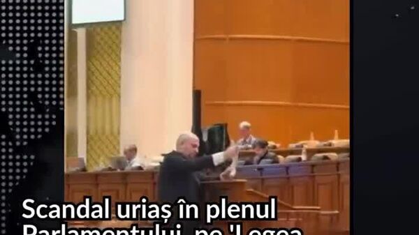 Депутат Силвиу Векслер в ходе дебатов в стенах румынского парламента по ужесточению норм о борьбе с экстремизмом разорвал портрет Михая Эминеску, Николае Йорга и Василе Александри Депутат Силвиу Векслер в ходе дебатов в стенах румынского парламента по ужесточению норм о борьбе с экстремизмом разорвал портрет Михая Эминеску, Николае Йорга и Василе Александри - Sputnik Молдова