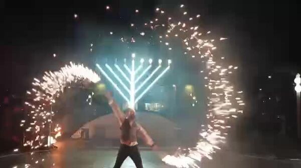 Так в приднестровских Бендерах отмечают Хануку Так в приднестровских Бендерах отмечают Хануку - Sputnik Молдова