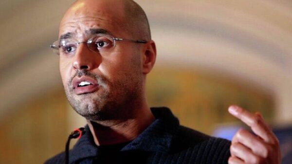 Fiul lui Muammar Gaddafi, Saif al-Islam, a murit într-un conflict armat la sud de Tripoli, relatează Abaad News - Sputnik Moldova