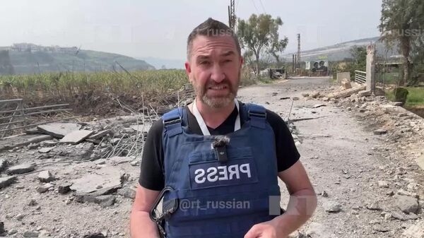 RT publică videoclipul cu lovitura unei rachete israeliene lângă jurnaliștii săi din Liban - Sputnik Moldova