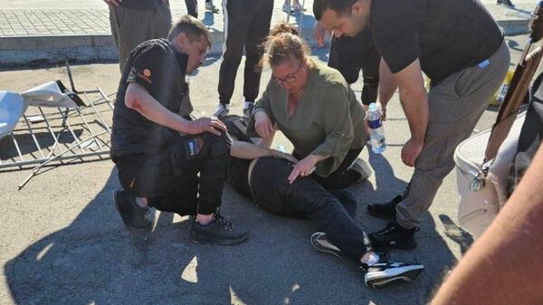 Фото раненых после того, как дрифтующий гонщик на тренировке перед соревнованиями влетел в толпу в Кишиневе - Sputnik Молдова