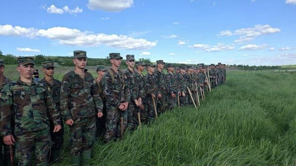 Ministerul Apărării anunță că militarii Armatei Naționale au intervenit în localitățile afectate de ploile abundente și riscul de inundații, pentru acordarea sprijinului necesar autorităților publice locale și cetățenilor - Sputnik Moldova