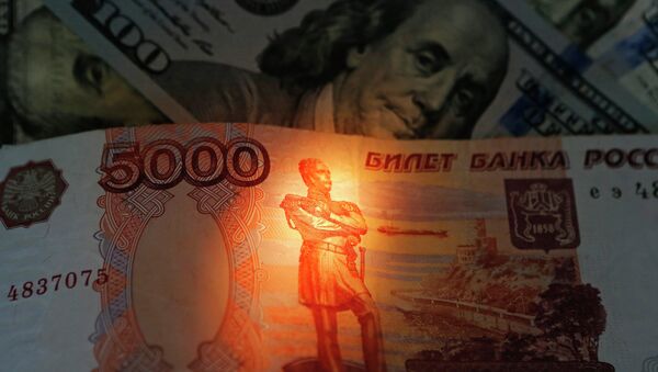 Banknotes of US dollars and rubles - Sputnik Moldova-România