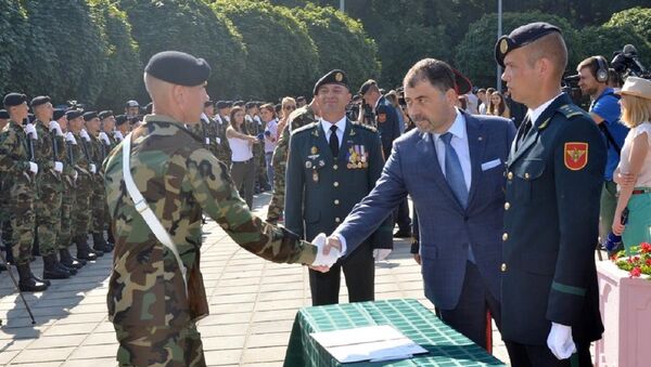 Ministrul Apărării al Republicii Moldova Anatol Șalaru la o ceremonie militară - Sputnik Moldova-România