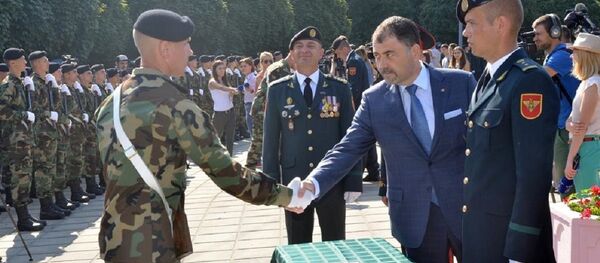 Ministrul Apărării al Republicii Moldova Anatol Șalaru la o ceremonie militară - Sputnik Moldova-România