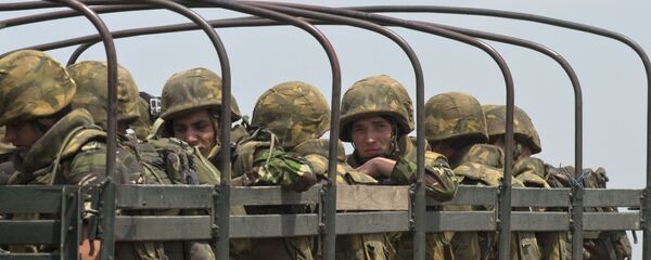 Szeregowcu rumuńskiej piechoty morskiej w czasie ćwiczeń NATO w rejonie Babagad w Rumunii - Sputnik Moldova