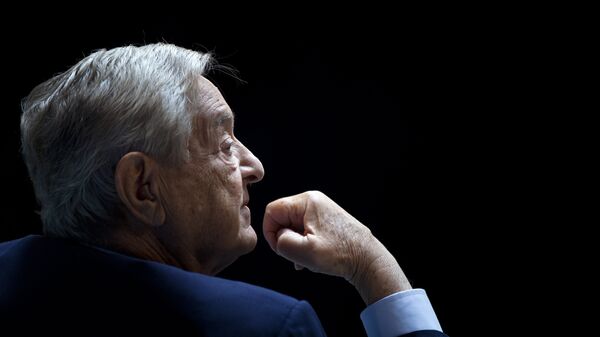 George Soros, Chairman of Soros Fund Management, listens during a seminar titled Charting A New Growth Path for the Euro Zone at the annual International Monetary Fund and World Bank meetings September 24, 2011 in Washington, DC. - Sputnik Moldova