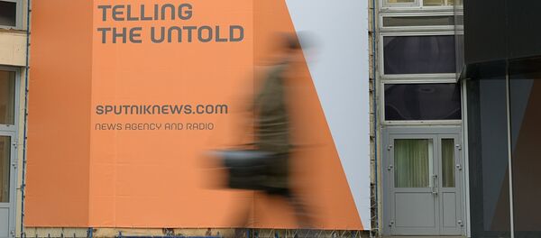 Логотип международного информационного бренда Спутник - Sputnik Moldova