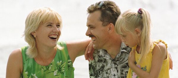 Семья на отдыхе - Sputnik Молдова