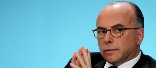 French Interior Minister Bernard Cazeneuve llstens a French Prime Minister Manuel Valls unveils new security measures at the Elysee Palace in Paris, Wednesday, Jan. 21, 2015. - Sputnik Moldova-România