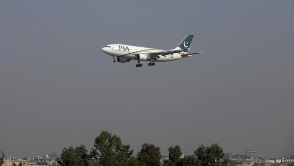 A Pakistan International Airlines (PIA) passenger plane arrives at the Benazir International airport in Islamabad, Pakistan. (File) - Sputnik Moldova-România