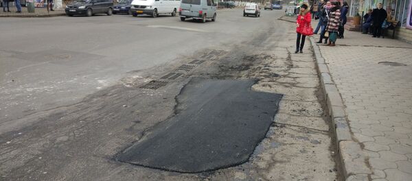 Ремонт дороги на улице Иона Крянгэ в Кишиневе - Sputnik Молдова
