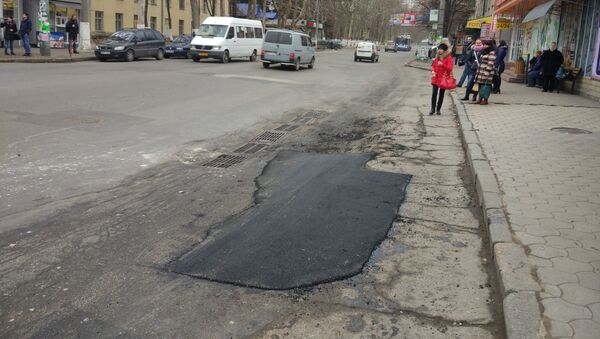 Ремонт дороги на улице Иона Крянгэ в Кишиневе - Sputnik Молдова
