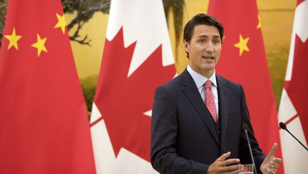 Canada's Prime Minister Justin Trudeau speaks during a joint press conference at the Great Hall of the People in Beijing, Wednesday, Aug. 31, 2016. - Sputnik Moldova-România