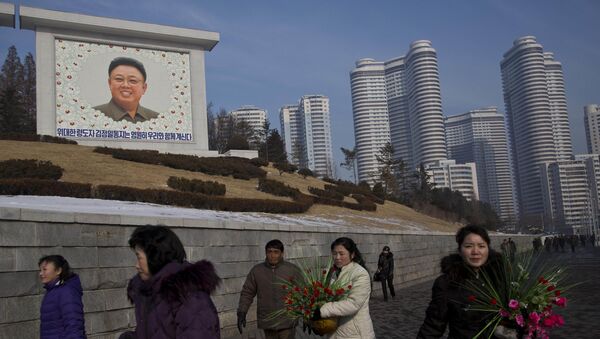 Портрет Ким Чен Ира в Пхеньяне - Sputnik Молдова