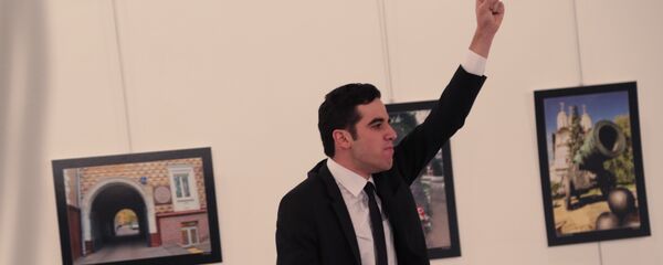 Фото мужчины, предположительно атаковавшего посла России в Турции Андрея Карлова - Sputnik Молдова