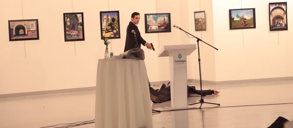 Фото мужчины, предположительно атаковавшего посла России в Турции Андрея Карлова - Sputnik Moldova-România