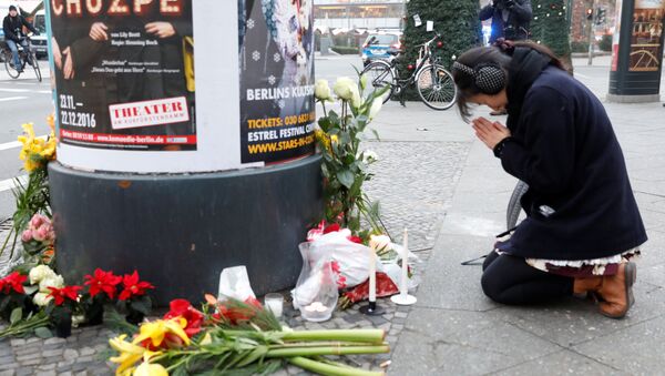 Gedenken der Opfer der Tragödie auf Berliner Weihnachtsmarkt - Sputnik Moldova-România