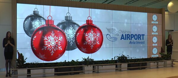 Вся жизнь аэропорта Кишинева - на гигантском информационном панно Вся жизнь аэропорта Кишинева - на гигантском информационном панно - Sputnik Молдова