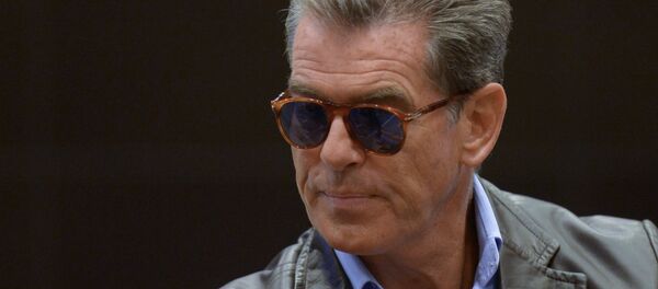 Actorul Piers Brosnan a jucat o serie de roluri în filme cu agenți și spioni americani - Sputnik Moldova