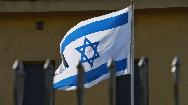 The flag on the premises of the Embassy of Israel in Moscow which has suspended its operations as the diplomats go on strike. - Sputnik Moldova