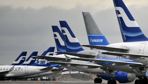 Passenger planes of the Finnish national airline company Finnair stand on the tarmac at Helsinki international airport, Helsinki, Finland - Sputnik Moldova-România