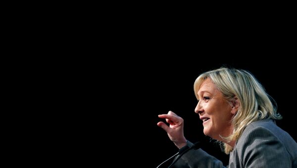 France's far-right National Front political party leader Marine Le Pen delivers a speech during a political rally in Six-Fours, near Toulon South Eastern France, March 16, 2015 - Sputnik Moldova-România