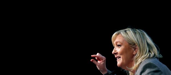 France's far-right National Front political party leader Marine Le Pen delivers a speech during a political rally in Six-Fours, near Toulon South Eastern France, March 16, 2015 - Sputnik Moldova-România