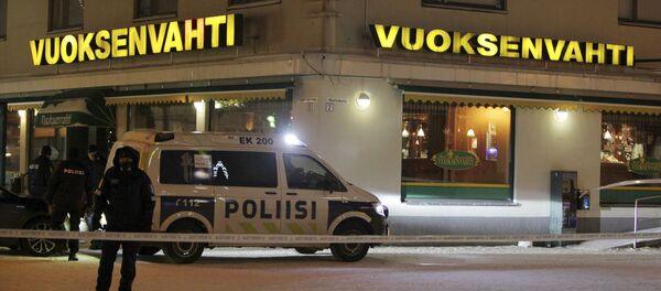 Police guards the area were three people were killed in a shooting incident at a restaurant in Imatra, Eastern Finland after midnight on December 4, 2016 - Sputnik Moldova-România