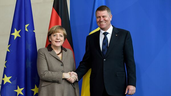 Klaus Iohannis și Angela Merkel - Sputnik Moldova-România