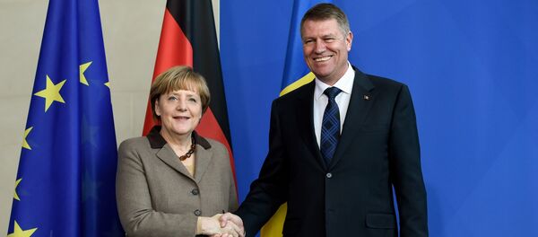 Klaus Iohannis și Angela Merkel Klaus Iohannis și Angela Merkel - Sputnik Moldova-România
