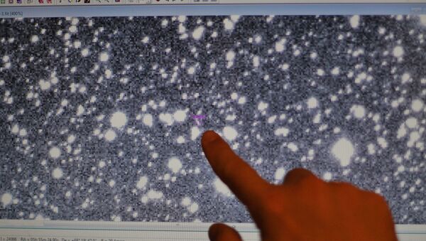 Астероид 2013 TV135 на снимке звездного неба - Sputnik Moldova
