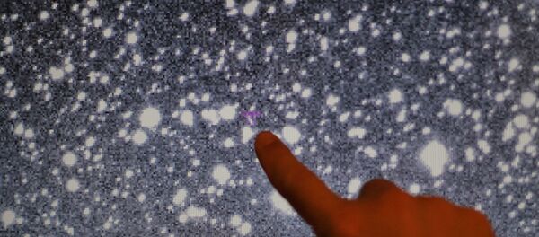 Астероид 2013 TV135 на снимке звездного неба - Sputnik Молдова