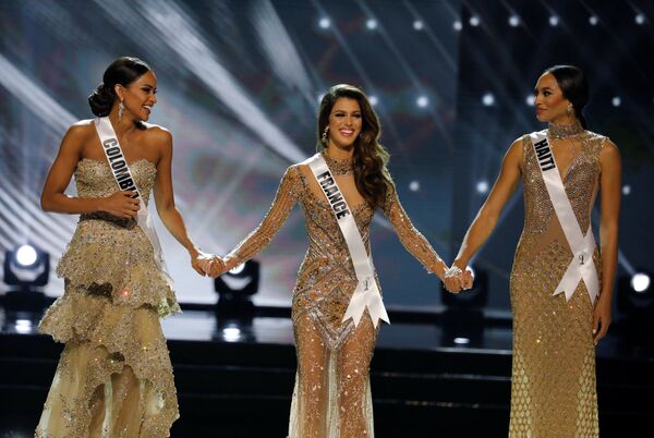 Prima vicemiss a devenit reprezentanta Haiti, iar a doua este Miss Columbia. Prima vicemiss a devenit reprezentanta Haiti, iar a doua este Miss Columbia. - Sputnik Moldova