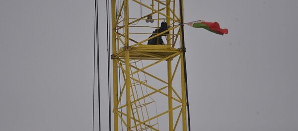 Минчанка в знак протеста забралась на башенный кран в Лебяжьем - Sputnik Молдова