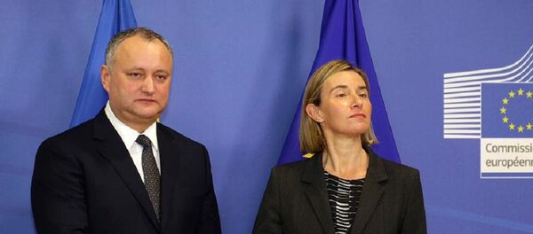 Igor Dodon și Federica Morherini Igor Dodon și Federica Morherini - Sputnik Moldova