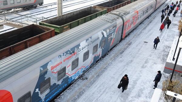 Un tren pe calea ferată din Siberia de Vest - Sputnik Moldova-România