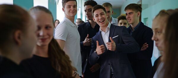 Сдача ЕГЭ по русскому языку в школах России - Sputnik Moldova