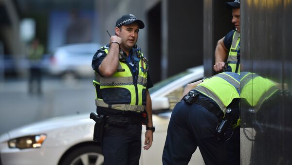 Police corden off Bourke Street after a car ploughed into pedestrians in the centre of Melbourne on January 20, 2017 - Sputnik Moldova-România