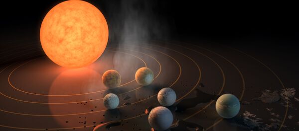 Так художник представил себе семь планет системы TRAPPIST-1 Так художник представил себе семь планет системы TRAPPIST-1 - Sputnik Молдова