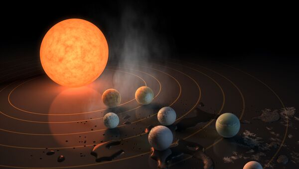 Так художник представил себе семь планет системы TRAPPIST-1 - Sputnik Молдова
