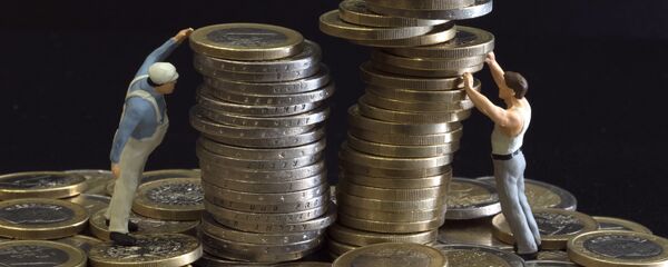 Picture taken on July 26, 2012 in Paris shows an illustration made with figurines and euro coins - Sputnik Moldova