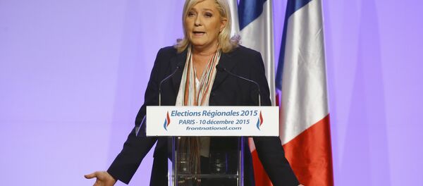 French far-right National Front Party leader, Marine Le Pen delivers a speech during a meeting in Paris, France, Thursday, Dec. 10, 2015. - Sputnik Moldova-România