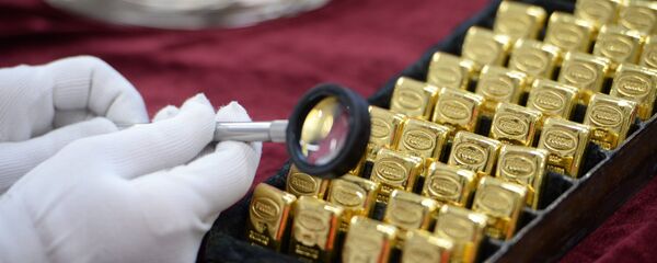 Lingouri bancare din aur Lingouri bancare din aur - Sputnik Moldova