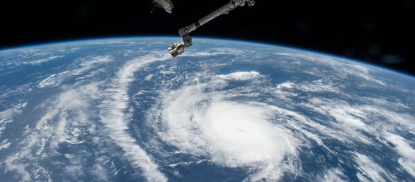 Hurricane Danny as seen from the International Space Station as it traversed the Caribbean Sea headed for Puerto Rico, the Dominican Republic and Cuba - Sputnik Молдова