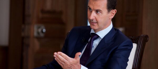 In this photo released on July 1, 2016, by the Syrian official news agency SANA, Syrian President Bashar Assad speaks during an interview with Australia's SBS news channel, in Damascus, Syria - Sputnik Moldova-România