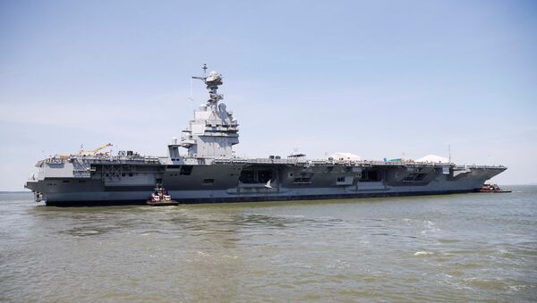Pre-Commissioning Unit Gerald R. Ford (CVN 78) is maneuvered by tug boats in the James River during the aircraft carrier's turn ship evolution in Newport News, Virginia, U.S. June 11, 2016. - Sputnik Молдова